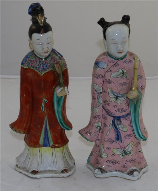 Two Chinese famille rose enamelled figures of female immortals, late 18th century, 26 and 24.5cm, losses and restoration